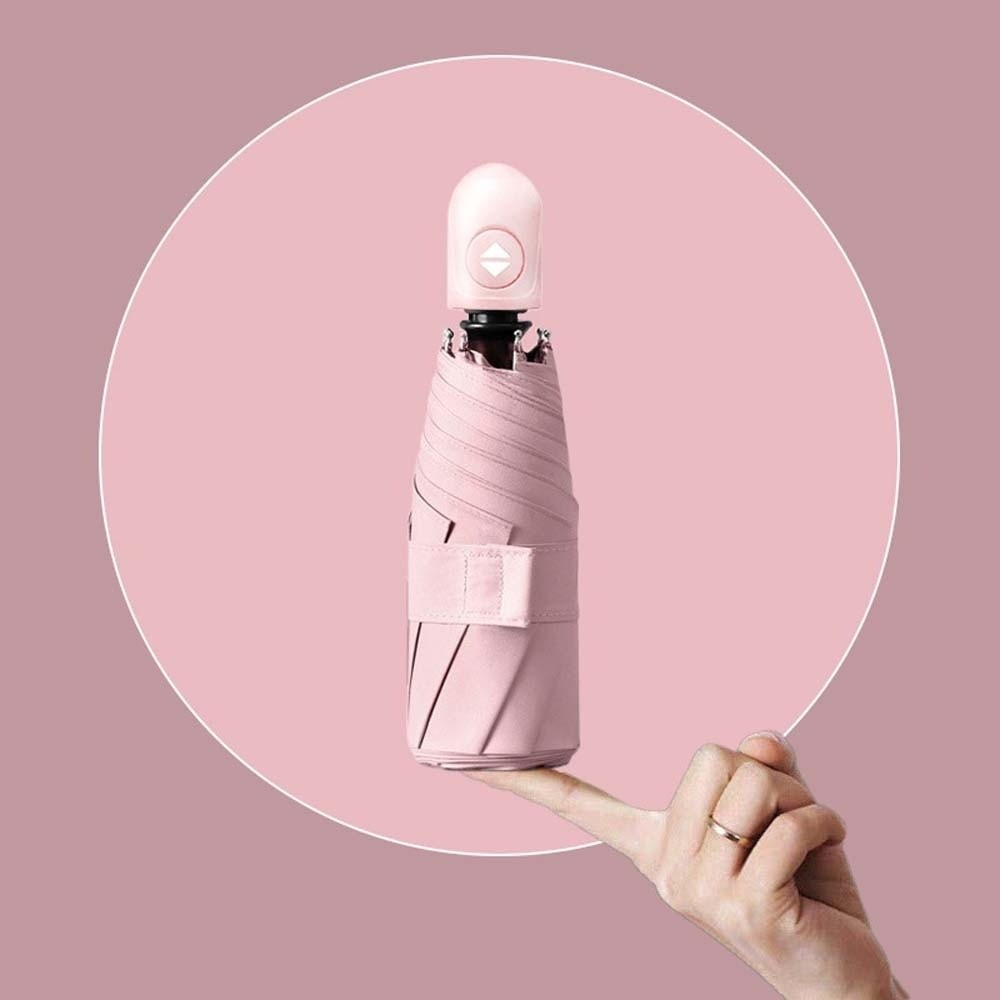 مظلة جيب خفيفة الوزن أوتوماتيك - مراجعة Travel Umbrella Compact وسعره