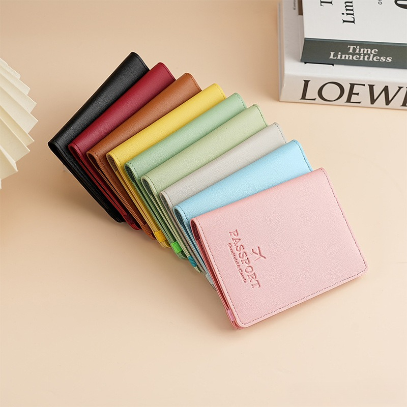 غطاء جواز سفر من الجلد الصناعي - مراجعة Travel Wallet Slim وسعره